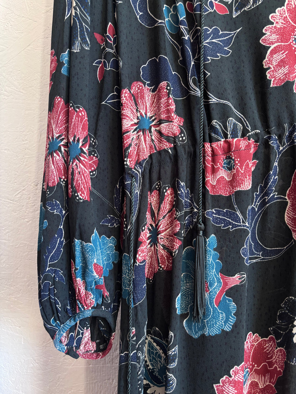 Revolve’s ASTR The Label Oversized Floral Boho Long Sleeve Hi Lo Tassel Drawstring Low Cut Maxi Dress