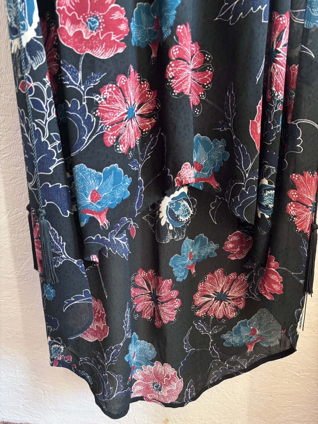 Revolve’s ASTR The Label Oversized Floral Boho Long Sleeve Hi Lo Tassel Drawstring Low Cut Maxi Dress