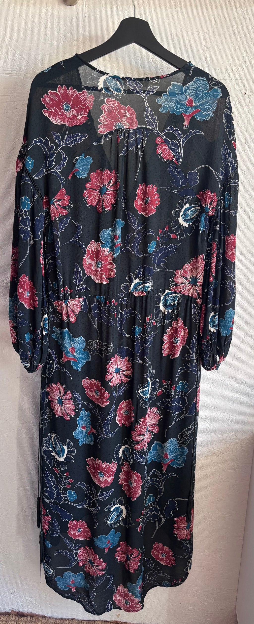 Revolve’s ASTR The Label Oversized Floral Boho Long Sleeve Hi Lo Tassel Drawstring Low Cut Maxi Dress