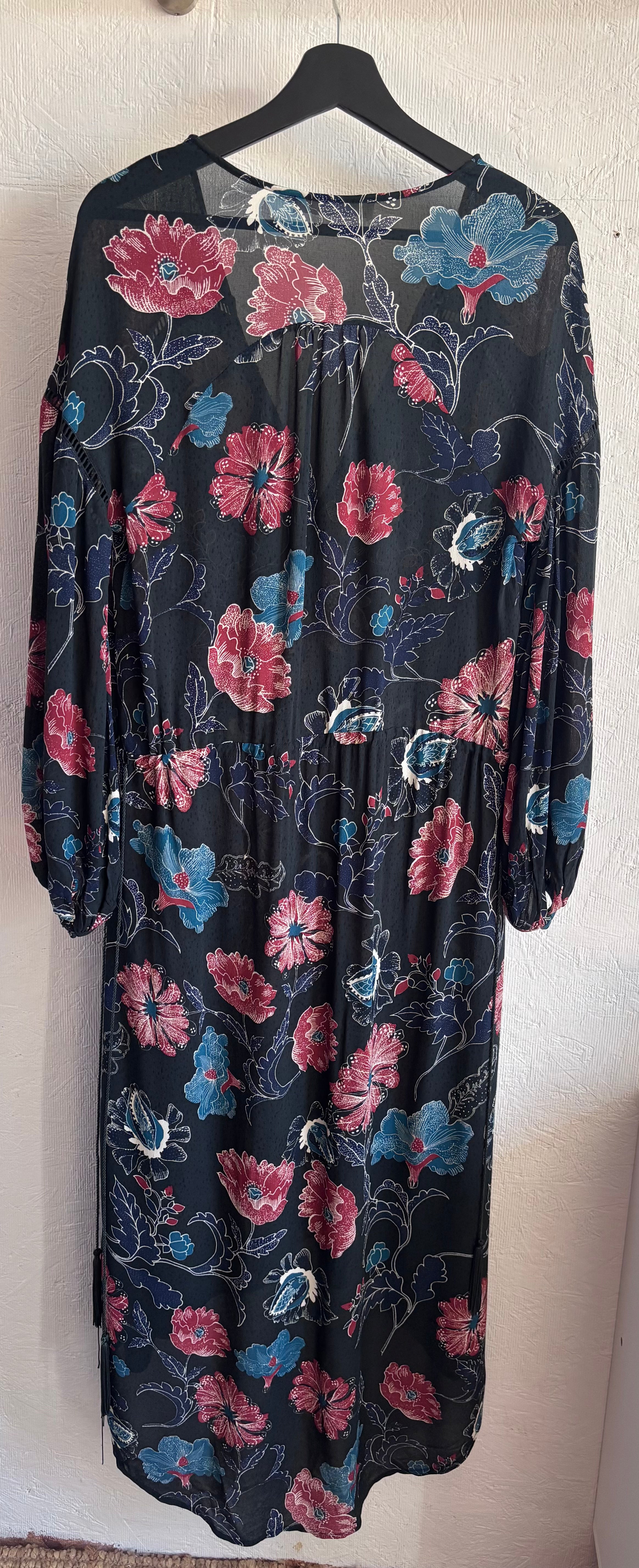 Revolve’s ASTR The Label Oversized Floral Boho Long Sleeve Hi Lo Tassel Drawstring Low Cut Maxi Dress