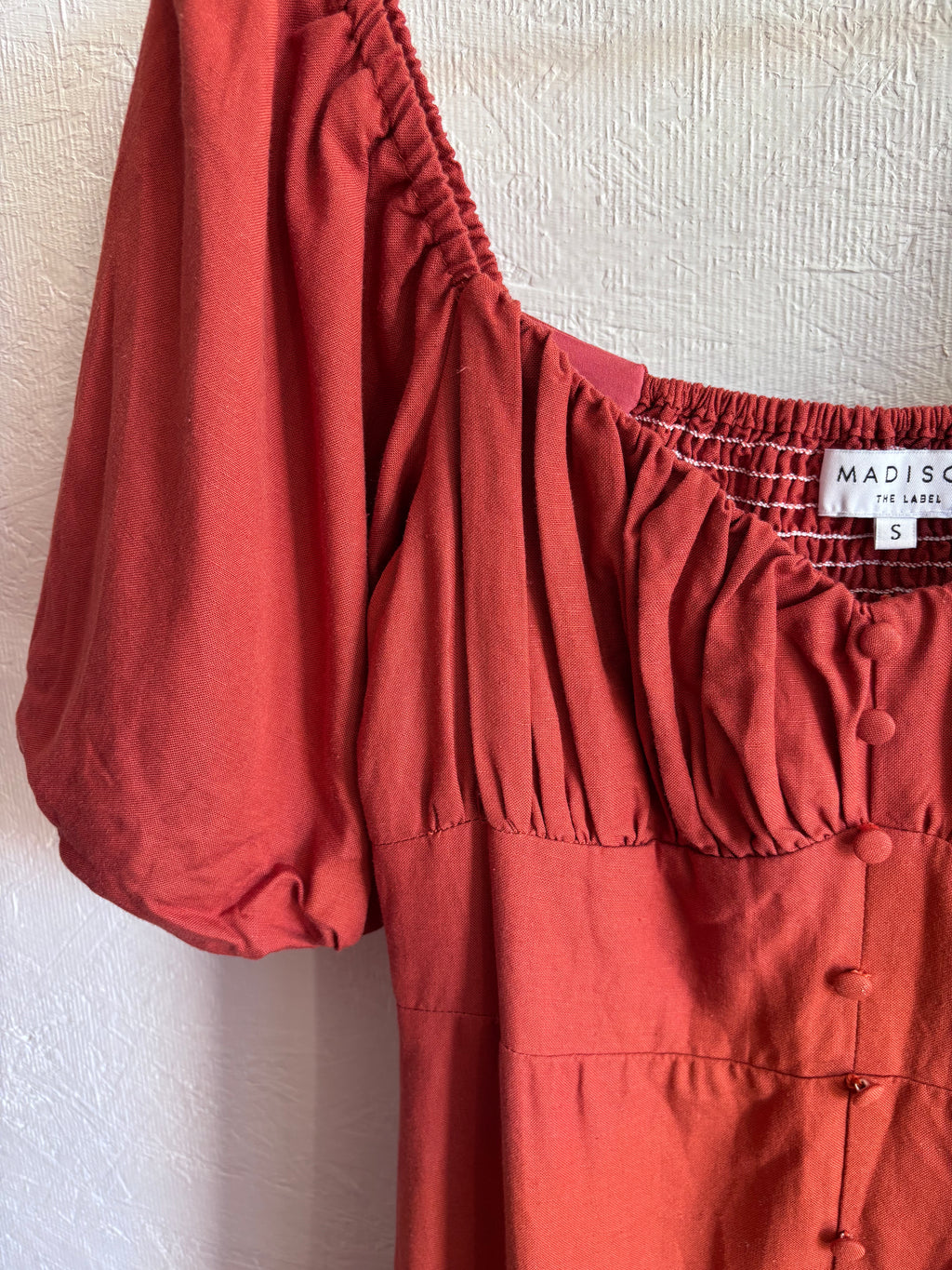 Revolve’s Madison The Label Burnt Orange Rust Linen Blend Puff Short Sleeve Button Down Midi Dress