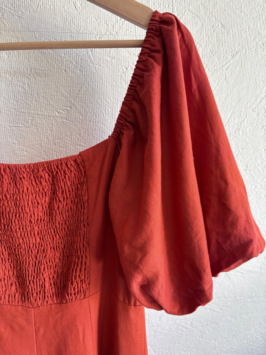 Revolve’s Madison The Label Burnt Orange Rust Linen Blend Puff Short Sleeve Button Down Midi Dress