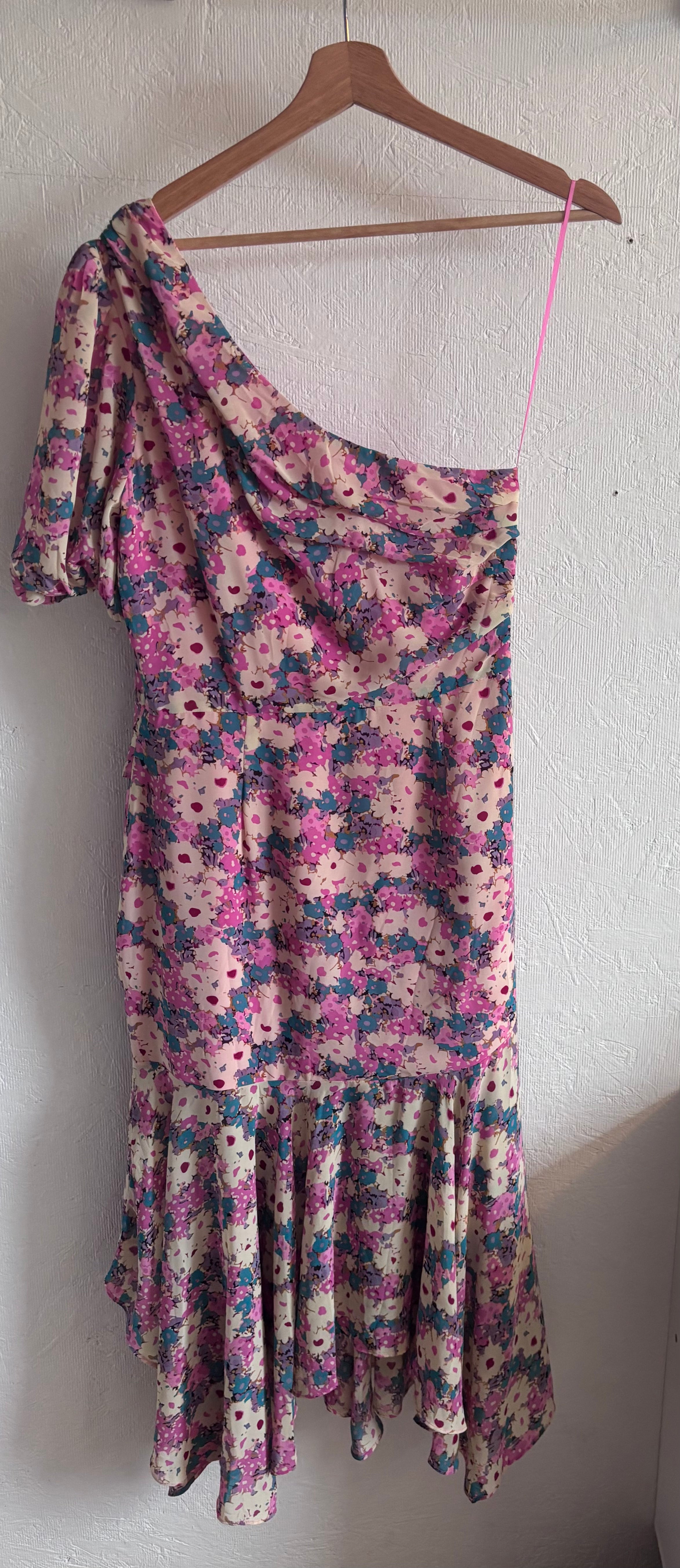 Revolve’s ASTR The Label Pink Floral One Puff Sleeve Asymmetrical Midi Dress