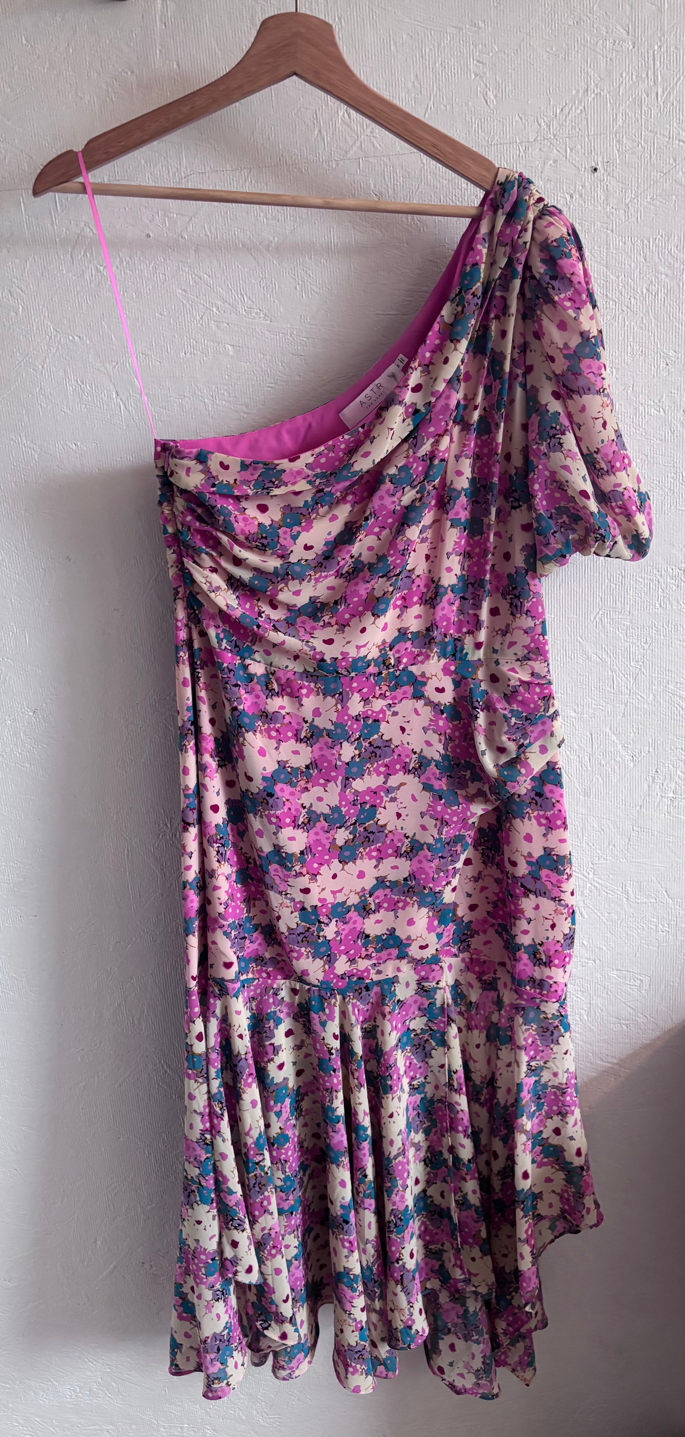 Revolve’s ASTR The Label Pink Floral One Puff Sleeve Asymmetrical Midi Dress